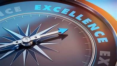 Compass needle pointing to the word excellence